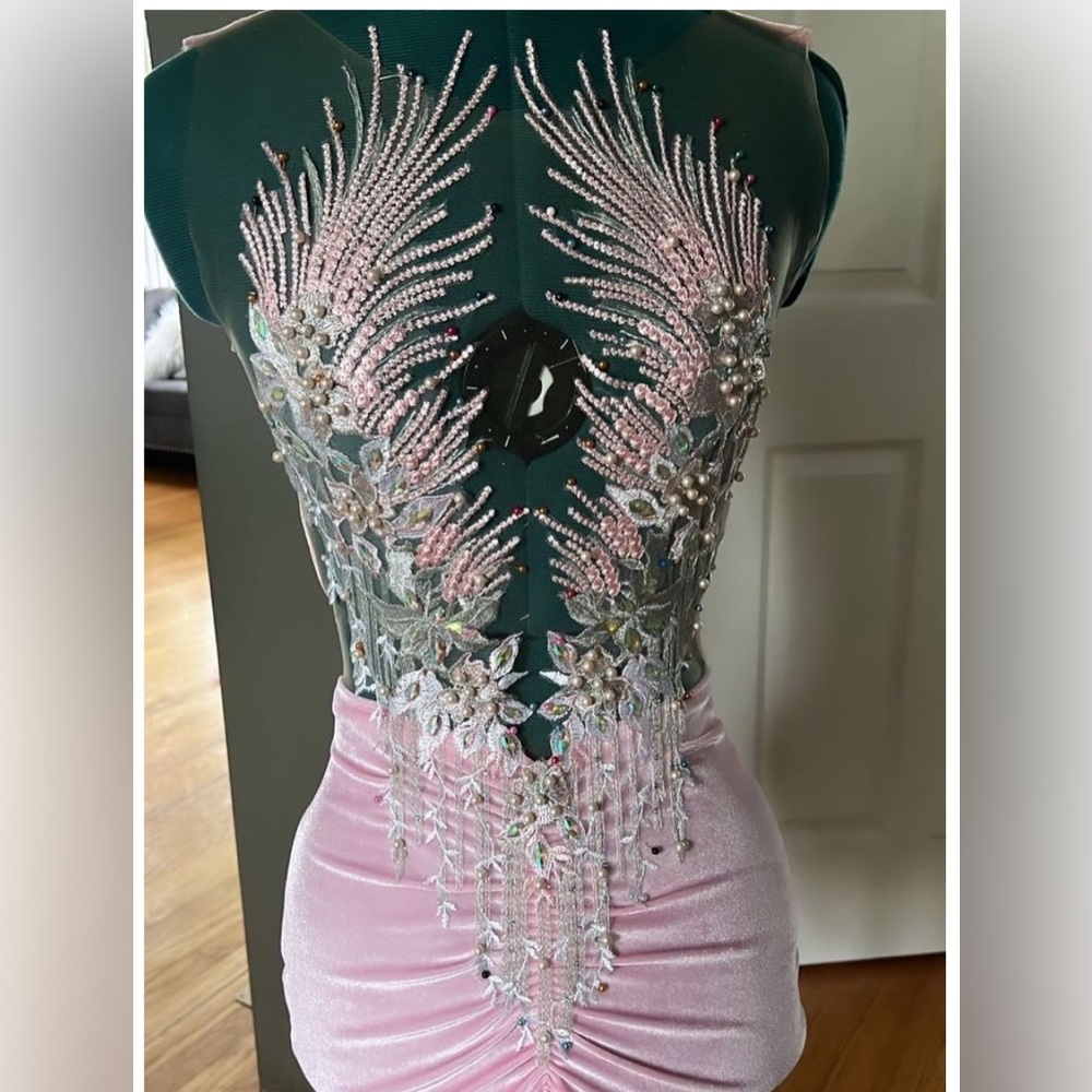 Custom made, the dress is one of a kind.